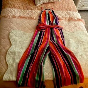 Romper that’s pink, purple and orange, blue and is very stylish